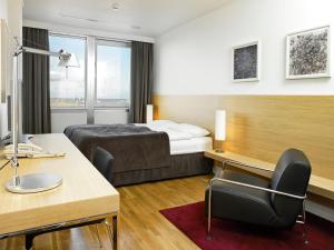 Łóżko lub łóżka w pokoju w obiekcie Reykjavik Natura - Berjaya Iceland Hotels