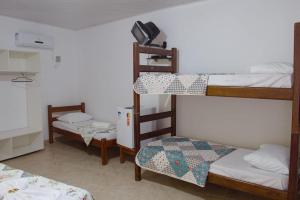 Postel nebo postele na pokoji v ubytování POUSADA DA ILHA