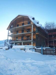 Ushguli Panorama Guest House v zimě