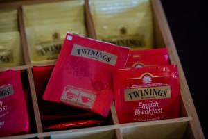 a group of pink packets of cheese on a shelf at Art & Jazz Hotel in Catania
