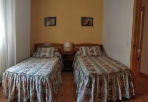 Posteľ alebo postele v izbe v ubytovaní Apartamento Pescadors + 9 fotografií