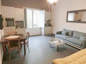 a living room with a couch and a table at Total Valencia Mercado Central in Valencia