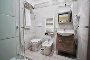 A bathroom at Noemi's rooms Guest House