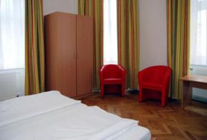 Postel nebo postele na pokoji v ubytování Suite Hotel 200m zum Prater