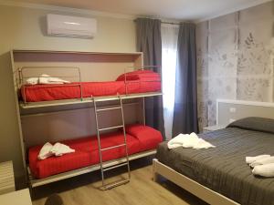 Postel nebo postele na pokoji v ubytování Tra I Castelli