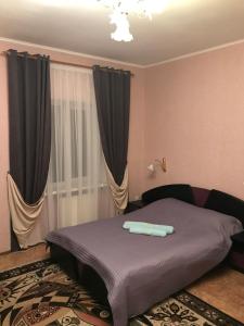 Posteľ alebo postele v izbe v ubytovaní Отель "Natali"