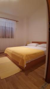 Postel nebo postele na pokoji v ubytování Apartments Žile