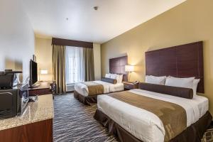 Voodi või voodid majutusasutuse Cobblestone Hotel & Suites - Stevens Point toas