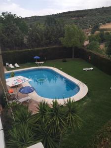 The swimming pool at or close to Hostal El Sevillano
