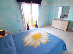 A bed or beds in a room at Holiday Home Is Molas by Interhome
