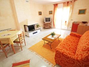 A seating area at Holiday Home Is Molas by Interhome