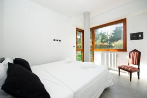 Postel nebo postele na pokoji v ubytování Justacasa - San Pietro