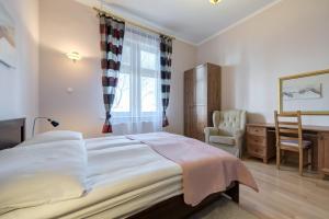 Posteľ alebo postele v izbe v ubytovaní DR Apartments - Kos
