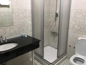 Koupelna v ubytování Hotel Argo