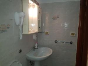 Koupelna v ubytování Hotel Aristotele