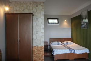 Postel nebo postele na pokoji v ubytování TJ Guest House
