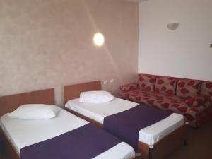 Postel nebo postele na pokoji v ubytování Hotel Flormang