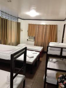 Cama o camas de una habitación en Hostel Perla Bohol