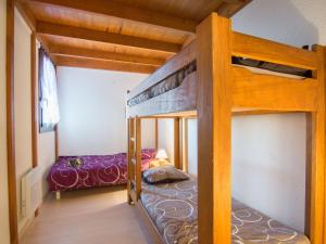 Postel nebo postele na pokoji v ubytování Apartment Douc-7 by Interhome