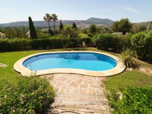 Der Swimmingpool an oder in der Nähe von Holiday Home Tesoro Park by Interhome