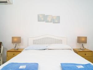 Ein Bett oder Betten in einem Zimmer der Unterkunft Holiday Home Tesoro Park by Interhome
