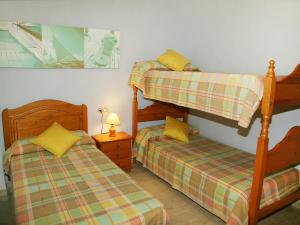 Postel nebo postele na pokoji v ubytování Holiday Home Mestral by Interhome