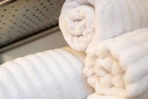 Posteľ alebo postele v izbe v ubytovaní Apartment Auretta