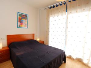 Katil atau katil-katil dalam bilik di Holiday Home Minini-3 by Interhome