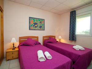 Posteľ alebo postele v izbe v ubytovaní Apartment Royal Delta-6 by Interhome
