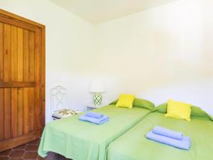 Postel nebo postele na pokoji v ubytování Apartment Cabopino-1 by Interhome