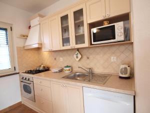 Kuchyň nebo kuchyňský kout v ubytování Holiday Home Mirela by Interhome + 29 fotografií