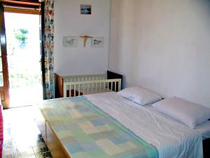 Ένα ή περισσότερα κρεβάτια σε δωμάτιο στο Apartment Zdenko-4 by Interhome