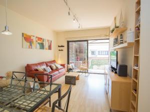 Posezení v ubytování Apartment Jardins Sa Boadella by Interhome