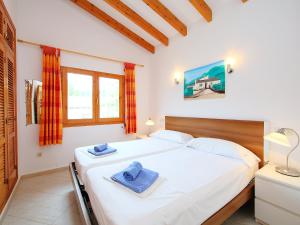 Posteľ alebo postele v izbe v ubytovaní Holiday Home Monte y Mar by Interhome