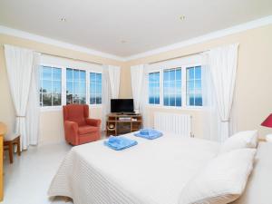 Μια τηλεόραση ή/και κέντρο ψυχαγωγίας στο Villa La Perla by Interhome