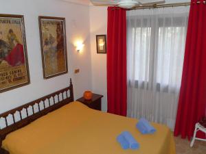Postel nebo postele na pokoji v ubytování Holiday Home El Paradiso by Interhome