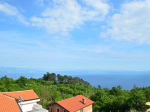 a view of the ocean from a house at Apartment Tihomir-3 by Interhome in Veprinac