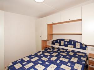 Säng eller sängar i ett rum på Holiday Home Gineprino-2 by Interhome