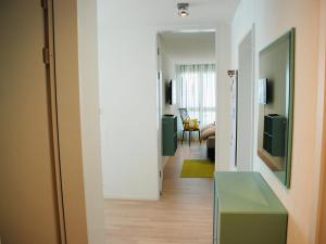 TV a/nebo společenská místnost v ubytování Apartment LaVille B-3-2 by Interhome