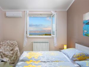 Postel nebo postele na pokoji v ubytování Holiday Home Bura by Interhome