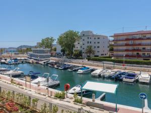 a marina with boats in the water and buildings at Apartment Girasol by Interhome in Jávea