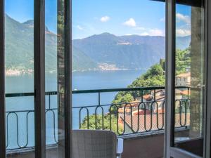 a view of a lake from a balcony at Apartment Sabrina by Interhome in Nesso