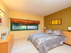 A bed or beds in a room at Holiday Home Vistamar by Interhome Még 18 kép