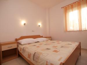 Postel nebo postele na pokoji v ubytování Apartment Maslina-1 by Interhome