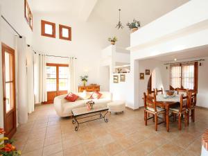 a living room with a couch and a table at Villa Ca Toni by Interhome in Moraira