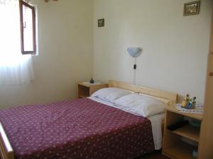 Postel nebo postele na pokoji v ubytování Holiday Home Marica by Interhome