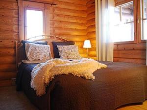 Postel nebo postele na pokoji v ubytování Holiday Home Koivuniemi by Interhome