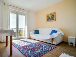 Ένα ή περισσότερα κρεβάτια σε δωμάτιο στο Apartment Silvana-3 by Interhome