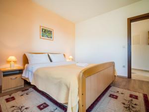 Ένα ή περισσότερα κρεβάτια σε δωμάτιο στο Apartment Silvana-3 by Interhome