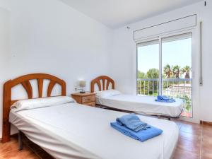 A bed or beds in a room at Holiday Home Villa Santa Marta II by Interhome